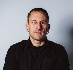 "Florian Wode, Studienrat und Coach"